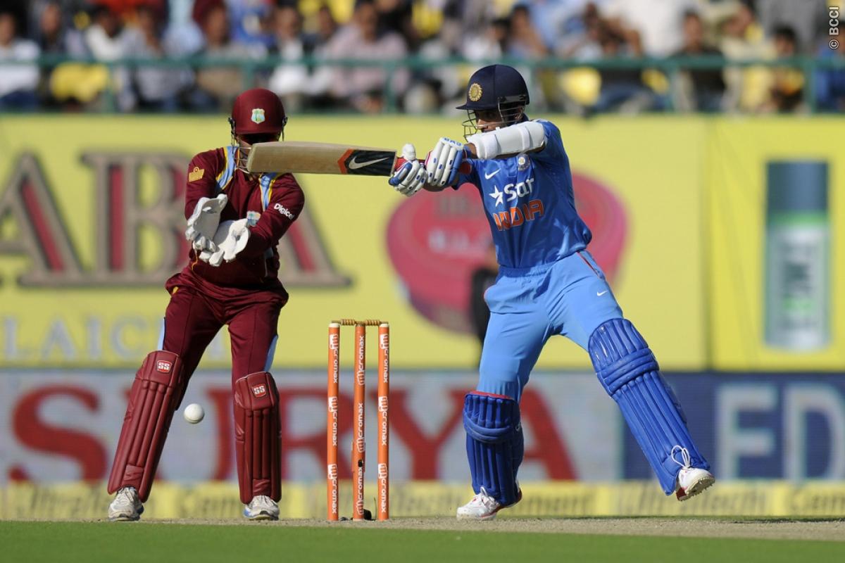 Ajinkya Rahane hitting a ball against West Indies in the fourth one-dayer. Image Credit: Pal Pillai/ Sportzpics / BCCI