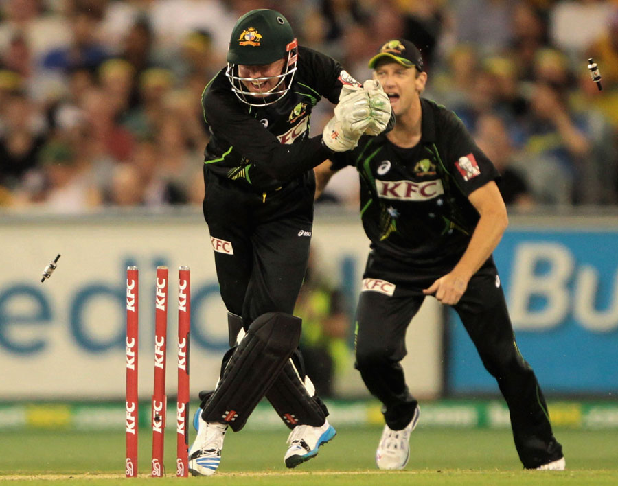Ben Dunk doing a stumping off Cameron Boyce. Image Credit: Cricket Australia