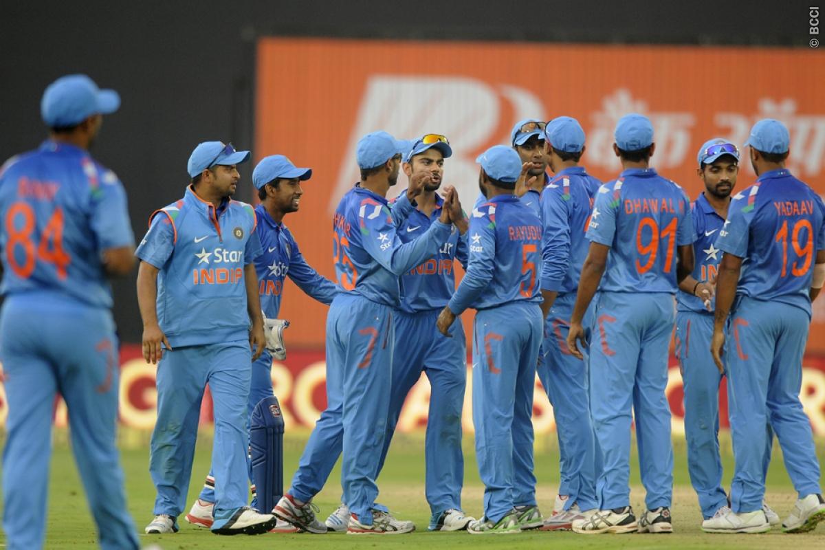 Indian teammates congratulate each other at the end of first innings during the 3rd ODI. Image Credit: Pal Pillai/ Sportzpics/ BCCI