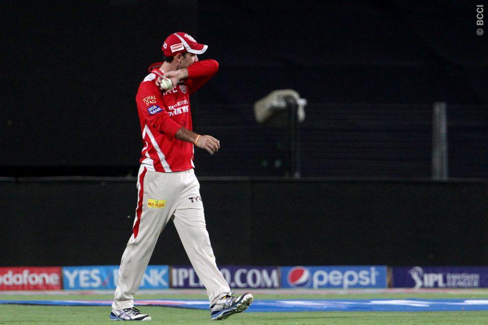 Kings XI Punjab player Glenn Maxwell reacts after dropping the catch of Kolkata Knight Riders player Andre Russell during match 14 of the Pepsi IPL 2015.