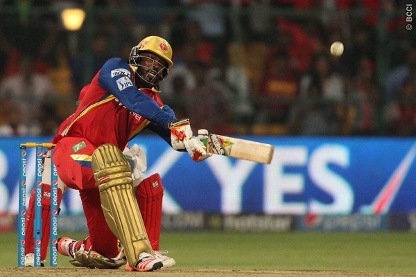 Chris Gayle of the Royal Challengers Bangalore hits over the top for six during match 40 of the Pepsi IPL 2015.