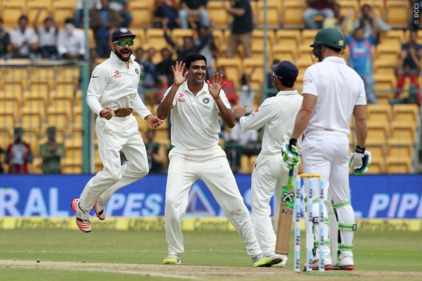 Ravichandran Ashwin of India celebrates the wicket of Faf du Plessis of South Africa.